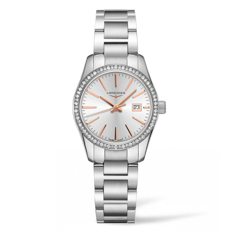 Longines Conquest Classic 29mm-29.5mm stainless steel case with diamond bezel, silver dial. Date display. Quartz movement. Water resistance of 5 bar. Stainless steel bracelet