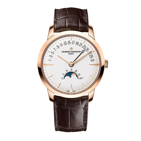 Vacheron Constantin Patrimony Moon Phase And Retrograde Date in a 42.5mm rose gold case with silver dial on leather strap, featuring a retrograde date, moon phase and self-winding movement.