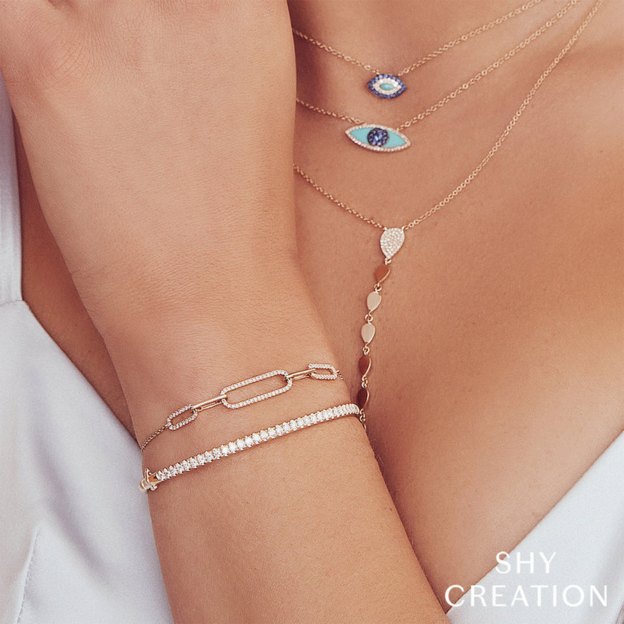 Shy Creation Diamond Bangle in 14 karat rose gold with diamonds totaling 0.88 carats.