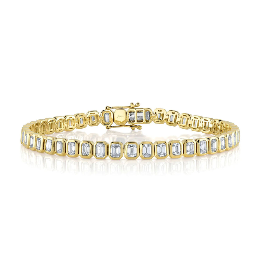 Shy Creation Diamond Tennis Bracelet in 14 karat yellow gold with emerald cut diamonds totaling 6.62 carats.
