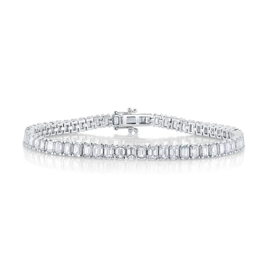 Shy Creation Diamond Tennis Bracelet in 14 karat white gold with emerald cut diamonds totaling 9.50 carats.