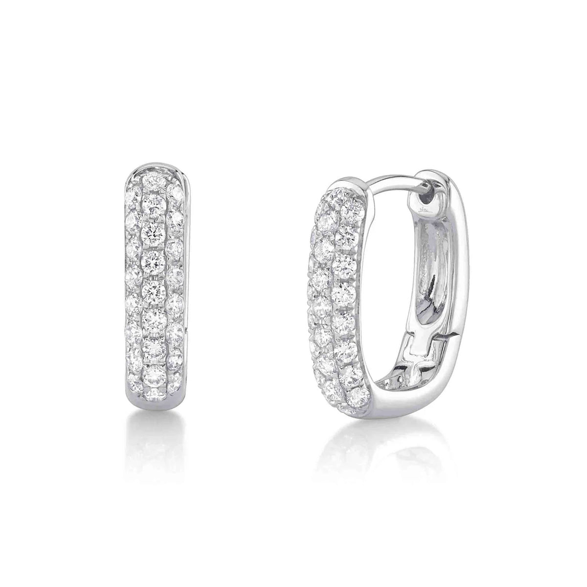 Shy Creation Diamond Huggie Earrings in 14 karat white gold with pave diamonds totaling 0.46 carats.