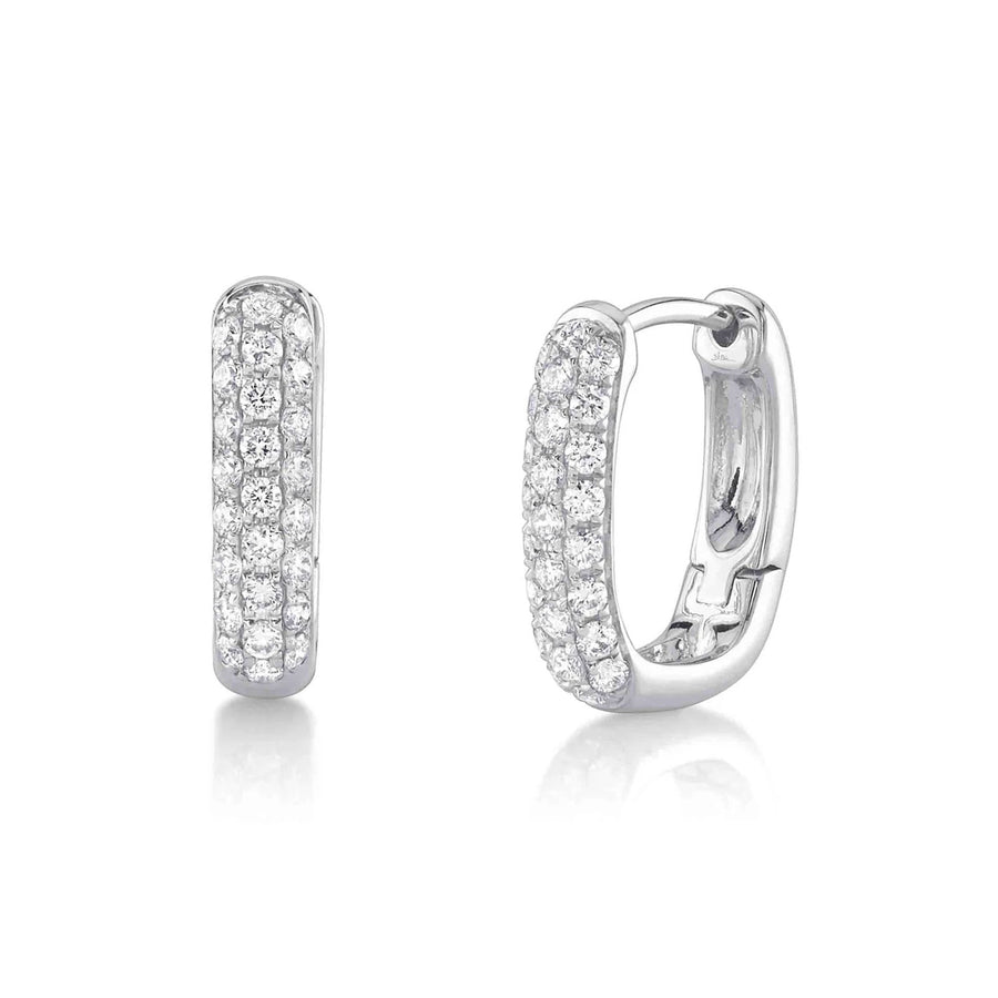 Shy Creation Diamond Huggie Earrings in 14 karat white gold with pave diamonds totaling 0.46 carats.