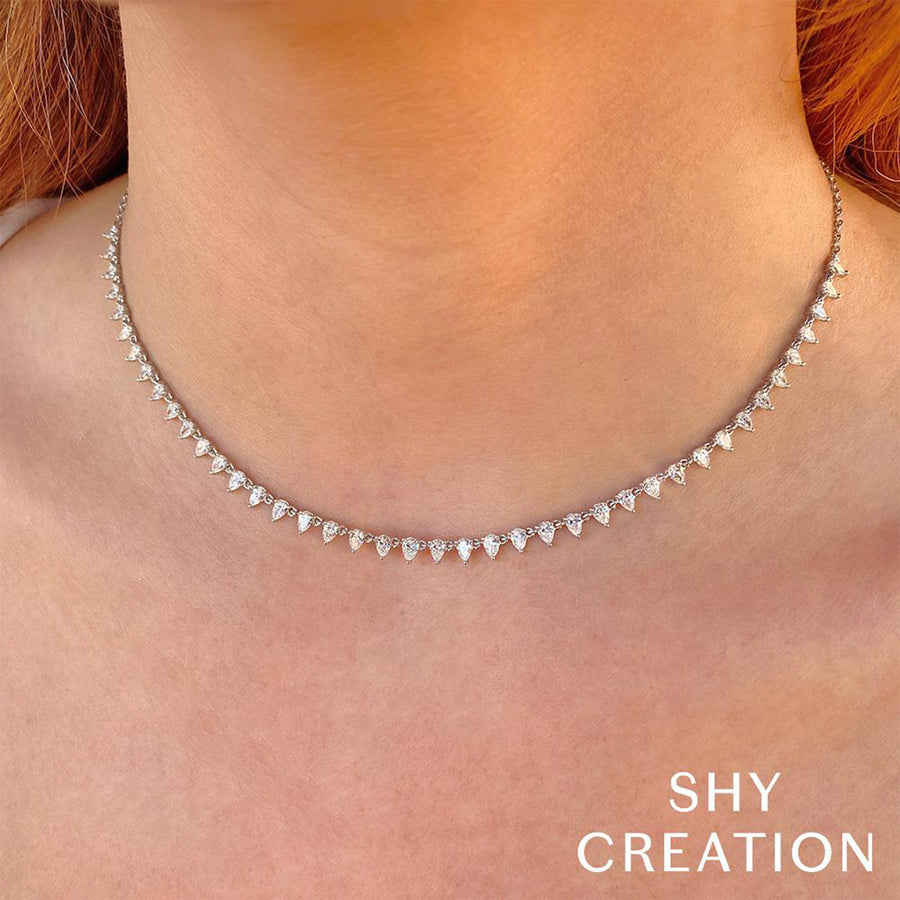 Shy Creation Diamond Pear Tennis Necklace in 14 karat white gold with diamonds totaling 2.74 carats with adjustable chain.