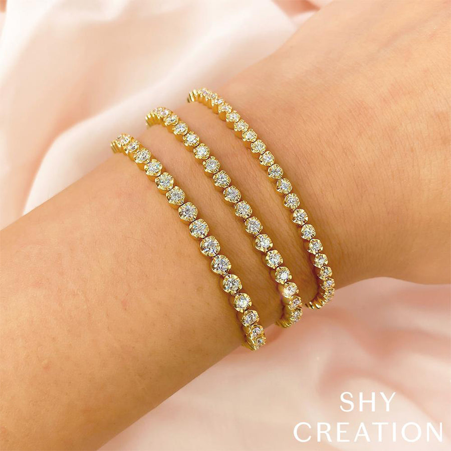 Shy Creation Diamond Line Bracelet in 14 karat yellow gold with diamonds totaling 2.67 carats.