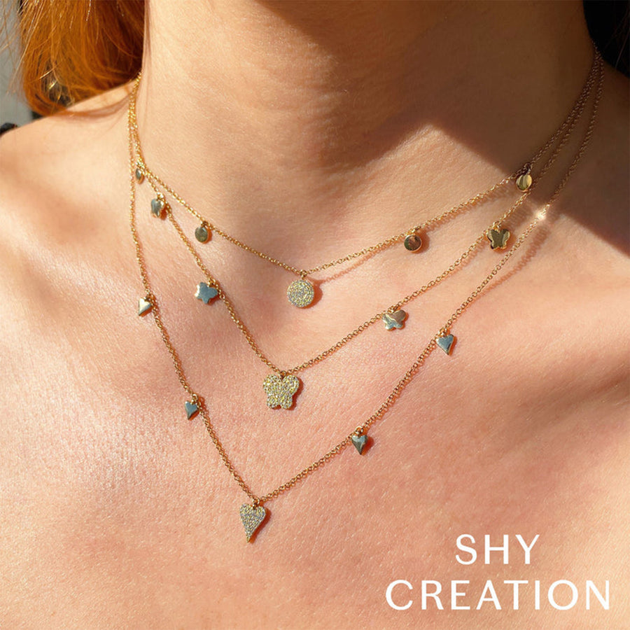 Shy Creation Diamond Pavé Heart Necklace in 14 karat yellow gold with diamonds totaling 0.07 carats.