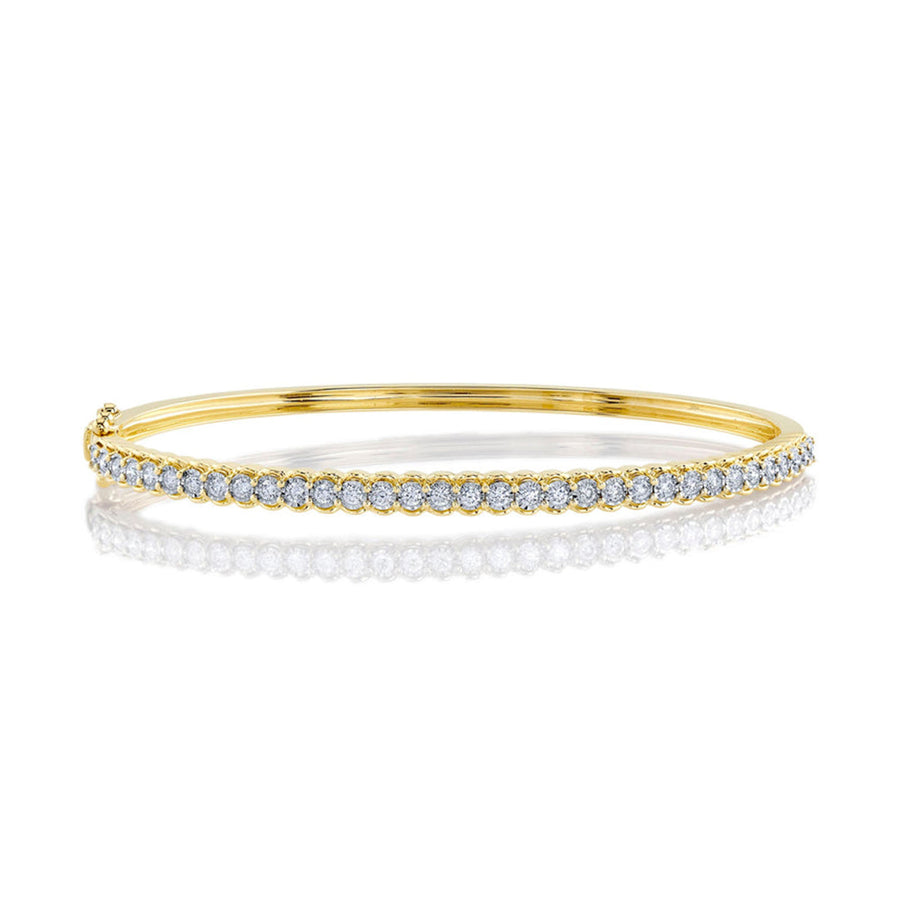 Shy Creation Diamond Bangle in 14 karat yellow gold with diamonds totaling 0.65 carats.