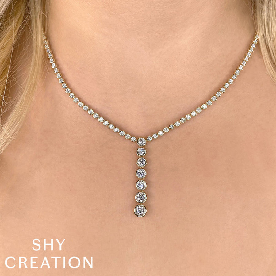 Shy Creation Diamond Bezel Lariat Necklace in 14 karat yellow gold with diamonds totaling 4.39 carats.