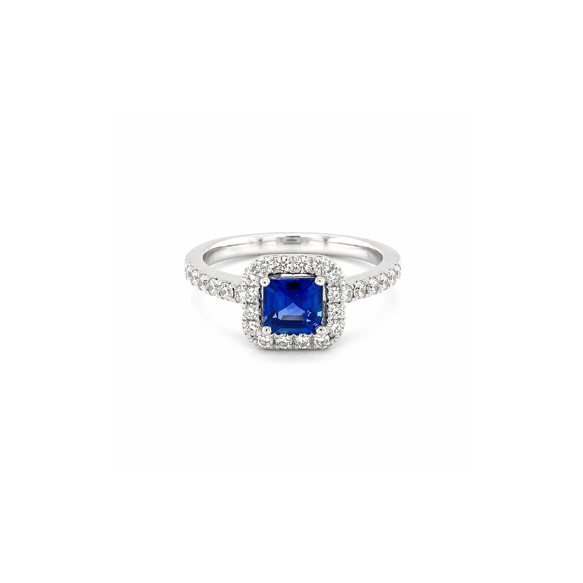 18K white gold ring featuring a center square-cut sapphire