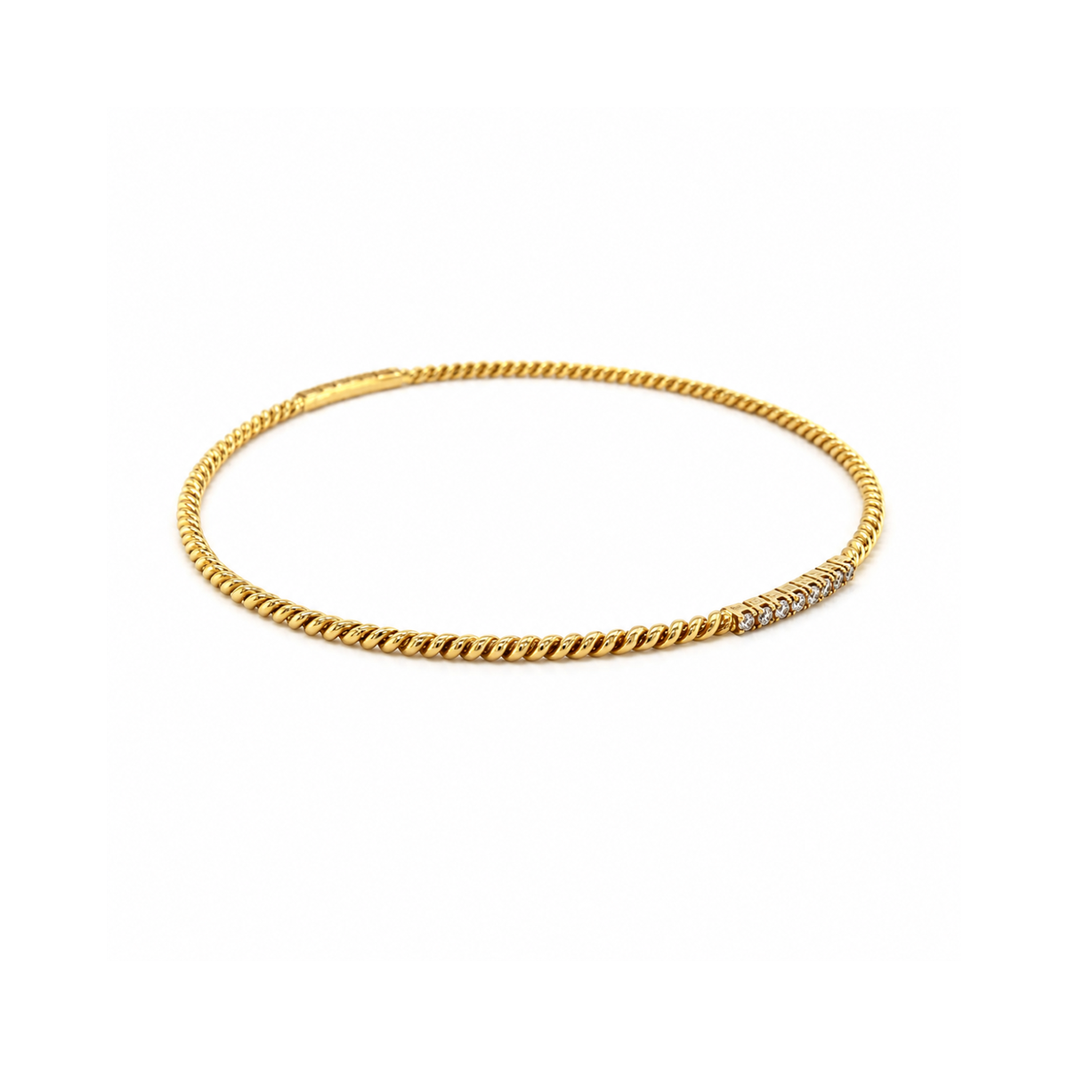 18 karat yellow gold diamond bangle.