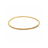 Diamond Bangle-18 karat yellow gold diamond bangle.