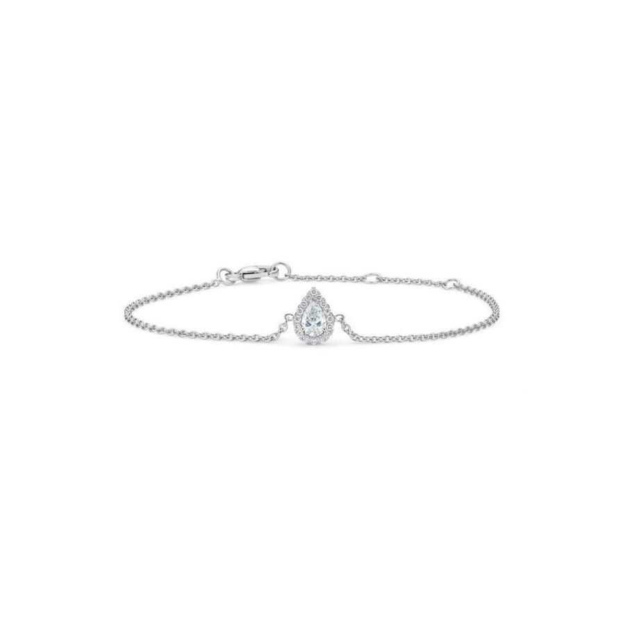 De Beers Aura Pear-Shaped Diamond Bracelet in 18 karat white gold with diamonds totaling 0.20 carats.