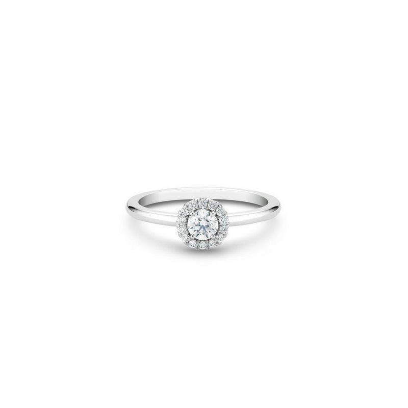 De Beers Aura Round Brilliant Diamond Ring-De Beers Aura Round Brilliant Diamond Ring in platinum. The ~0.20 carat round brilliant solitaire is surrounded by a halo of micropavé diamonds totalling ~0.10 carats.