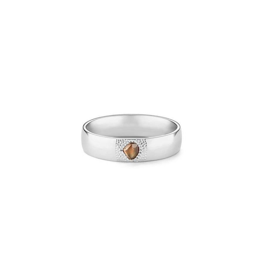 De Beers Talisman Large Band in 18 karat white gold with brown diamond rough with approximately 0.15 carats.