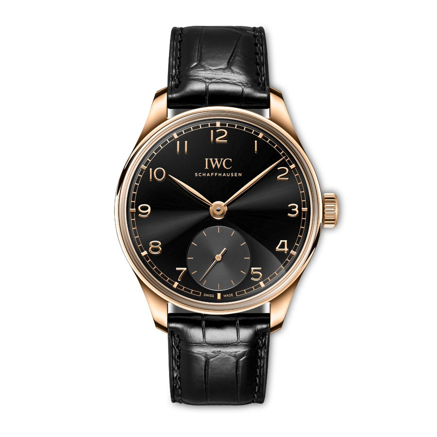 IWC Schaffhausen Portugieser Automatic in a 40.4mm 18ct 5N gold case with black obsidian dial on black Santoni alligator strap, featuring a small seconds display and automatic movement.