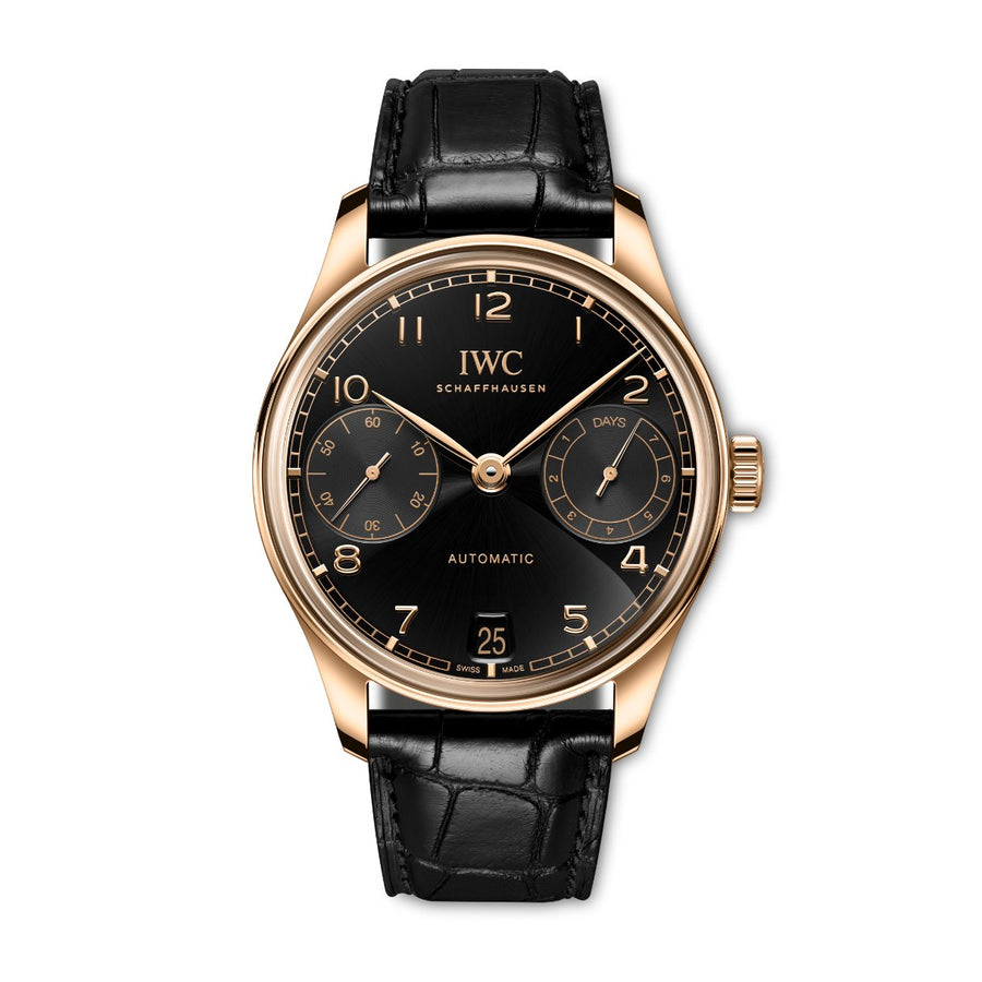 IWC Schaffhausen Portugieser Automatic 42 - IW501707 - IWC Schaffhausen Portugieser Automatic in a 42.4mm 18 ct 5N gold case with black obsidian dial on black leather Santoni strap, featuring a power reserve indicator, small seconds display, date display, and automatic movement.