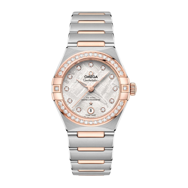 Omega Constellation 29mm - Meteorite-Omega Constellation 29mm - 131.25.29.20.99.001 - Omega Constellation in a 29mm stainless steel/Sedna gold diamond bezel case with grey meteorite dial on stainless steel/Sedna gold bracelet, featuring a date display and automatic movement.