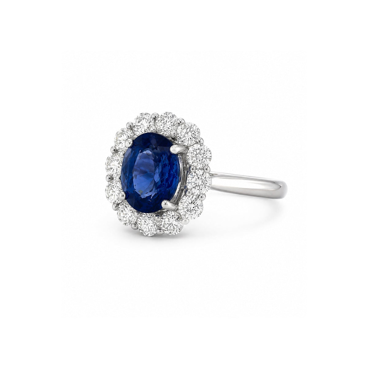Oval Brilliant Cut Blue Sapphire and Diamond Halo Ring
