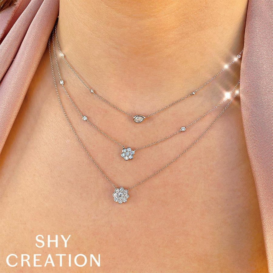 Shy Creation Diamond Flower Necklace in 14 karat white gold with diamonds totaling 0.33 carats.