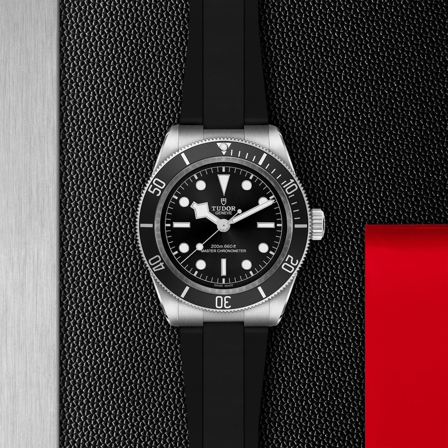 TUDOR Black Bay - M7941A1A0NU-0002 - TUDOR Black Bay in a 41mm stainless steel case with black dial on black rubber strap, featuring a bi-directional rotating bezel and automatic movement with up to 70 hours of power reserve.