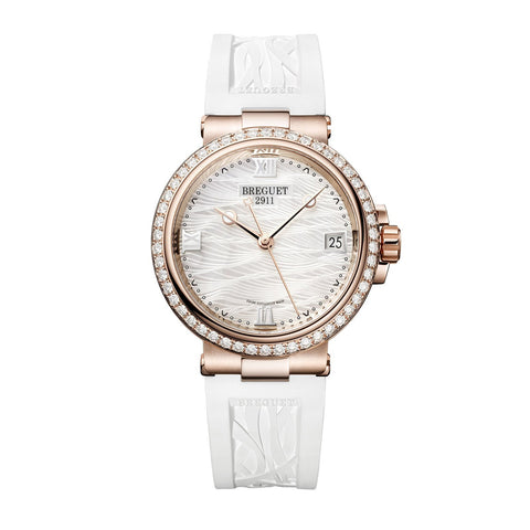 Breguet Marine Dame 9518-Breguet Marine Dame 9518 in 33.8mm rose gold case with mother-of-pearl dial on white rubber strap, featuring a date aperture and self-winding movement.
