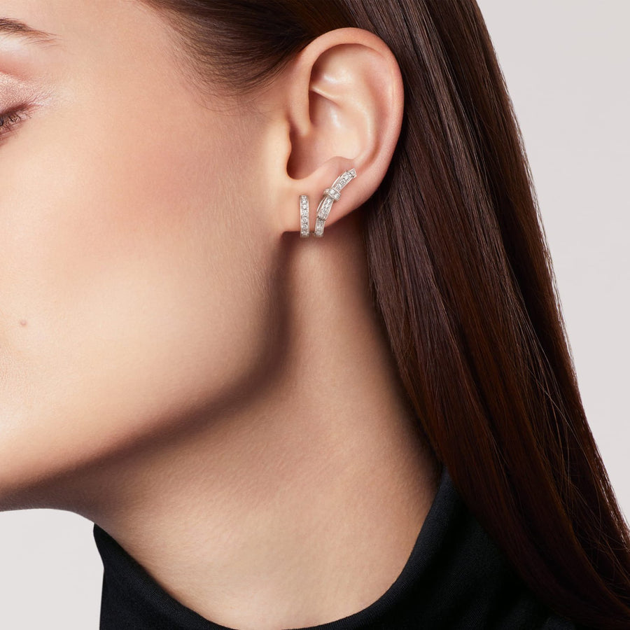 CHANEL Ruban Earrings in 18 karat white gold with diamonds totaling 0.73 carats.