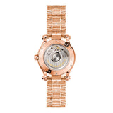 Chopard Happy Sport in 36mm rose gold case with silver dial and seven floating diamonds on rose gold bracelet, featuring a date display and automatic movement with 62 hours power reserve.