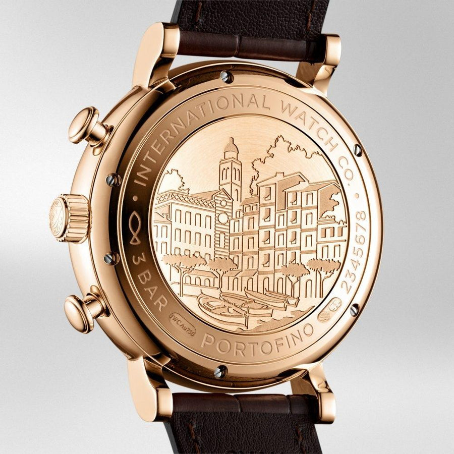 IWC Schaffhausen Portofino Chronograph 42 in rose gold with silver dial on leather strap featuring a chronograph function, day date display and automatic movement.
