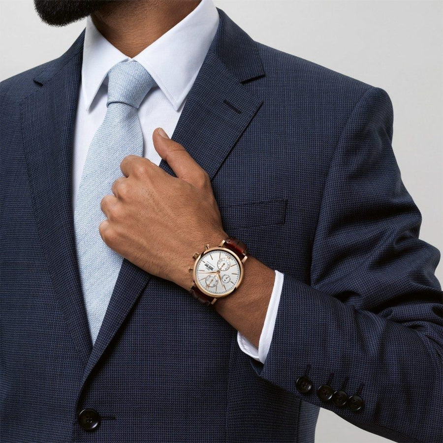 IWC Schaffhausen Portofino Chronograph 42 in rose gold with silver dial on leather strap featuring a chronograph function, day date display and automatic movement.