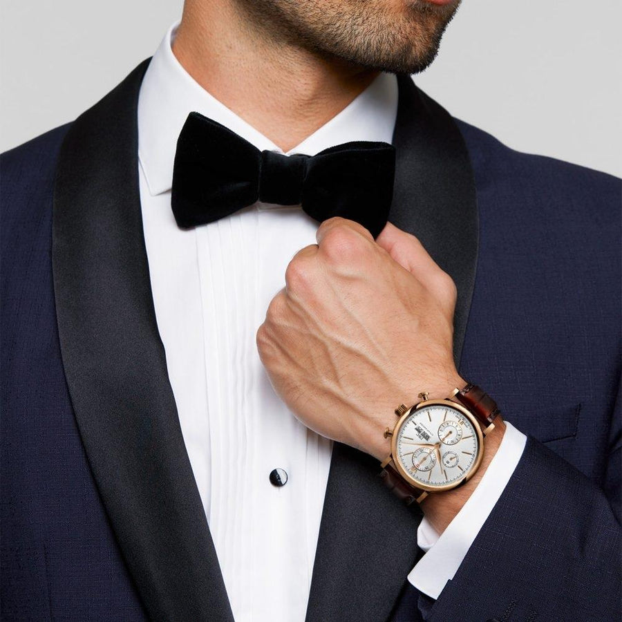 IWC Schaffhausen Portofino Chronograph 42 in rose gold with silver dial on leather strap featuring a chronograph function, day date display and automatic movement.