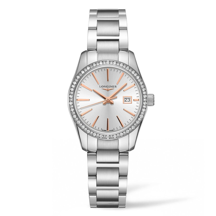 29.5mm stainless steel case with diamond bezel, silver dial. Date display. Quartz movement. Water resistance of 5 bar. Stainless steel bracelet