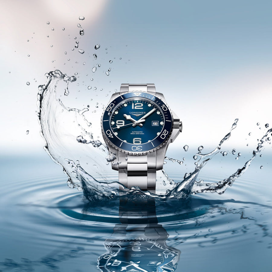 Longines HydroConquest in a 41mm stainless steel case with blue dial on stainless steel bracelet, featuring date display and automatic movement with up to 72 hours of power reserve.