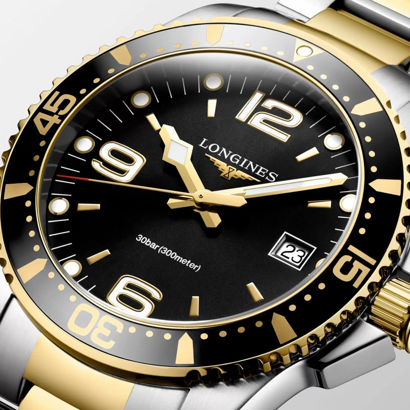 Longines HydroConquest 41mm-Longines HydroConquest in a 41mm stainless steel/yellow gold pvd case with black dial on stainless steel/yellow gold pvd bracelet, featuring a date display and quartz movement.