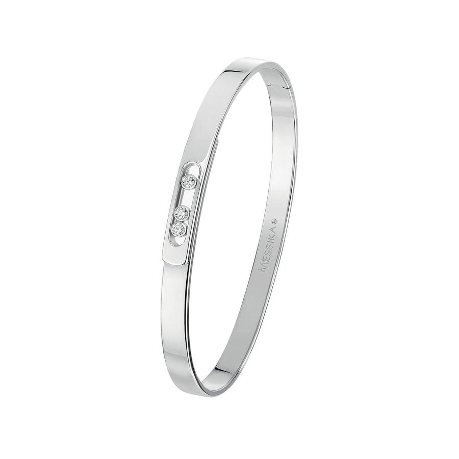 Move Noa bangle in 18 karat white gold with three moving diamonds.