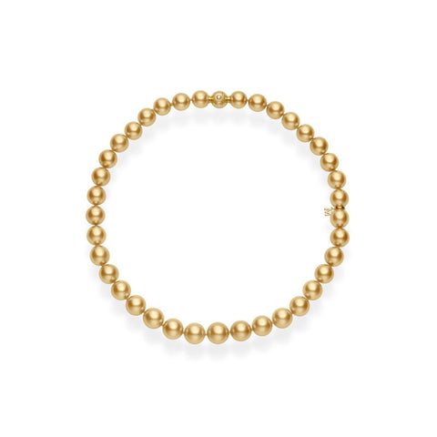Mikimoto Golden South Sea Cultured Pearl Strand in 18 karat yellow gold.