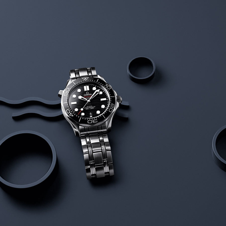 Omega Seamaster Diver 300M Co-Axial Master Chronometer in a 42mm stainless steel case with black dial on stainless steel bracelet, featuring a date display and automatic movement.