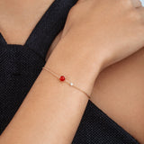 Piaget Possession Bracelet in 18 karat rose gold with red carnelian and diamond.