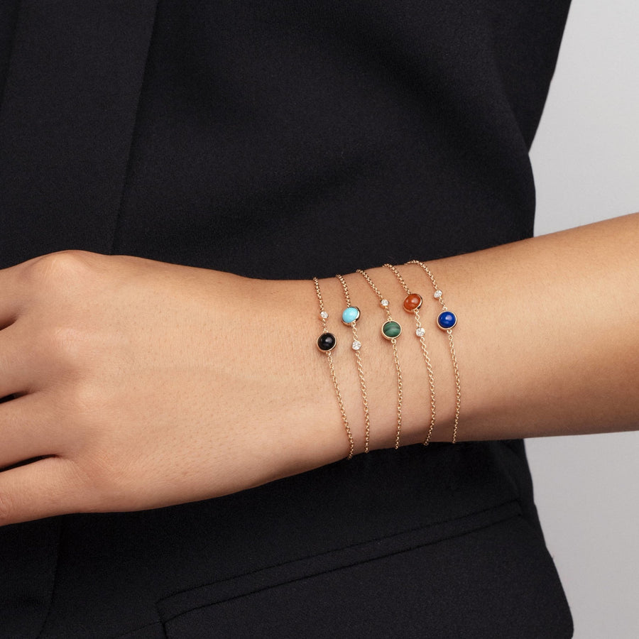 Piaget Possession Bracelet in 18 karat rose gold with red carnelian and diamond.