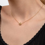 Piaget Rose Pendant in 18 karat rose gold with diamonds.