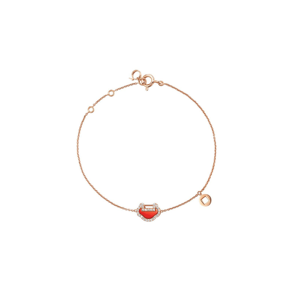 18 karat rose gold with red agate and diamond yu yi bracelet.