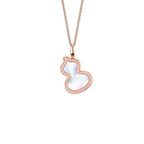 18 karat rose gold with mother-of-pearl and diamonds wulu pendant on chain.