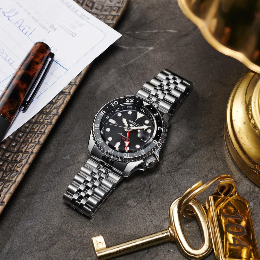 Seiko 5 Sports SKX Sports Style GMT Series SSK001 in a 42mm stainless steel case with black dial on stainless steel bracelet, featuring a date display, GMT function, and automatic movement with up to 41 hours of power reserve.
