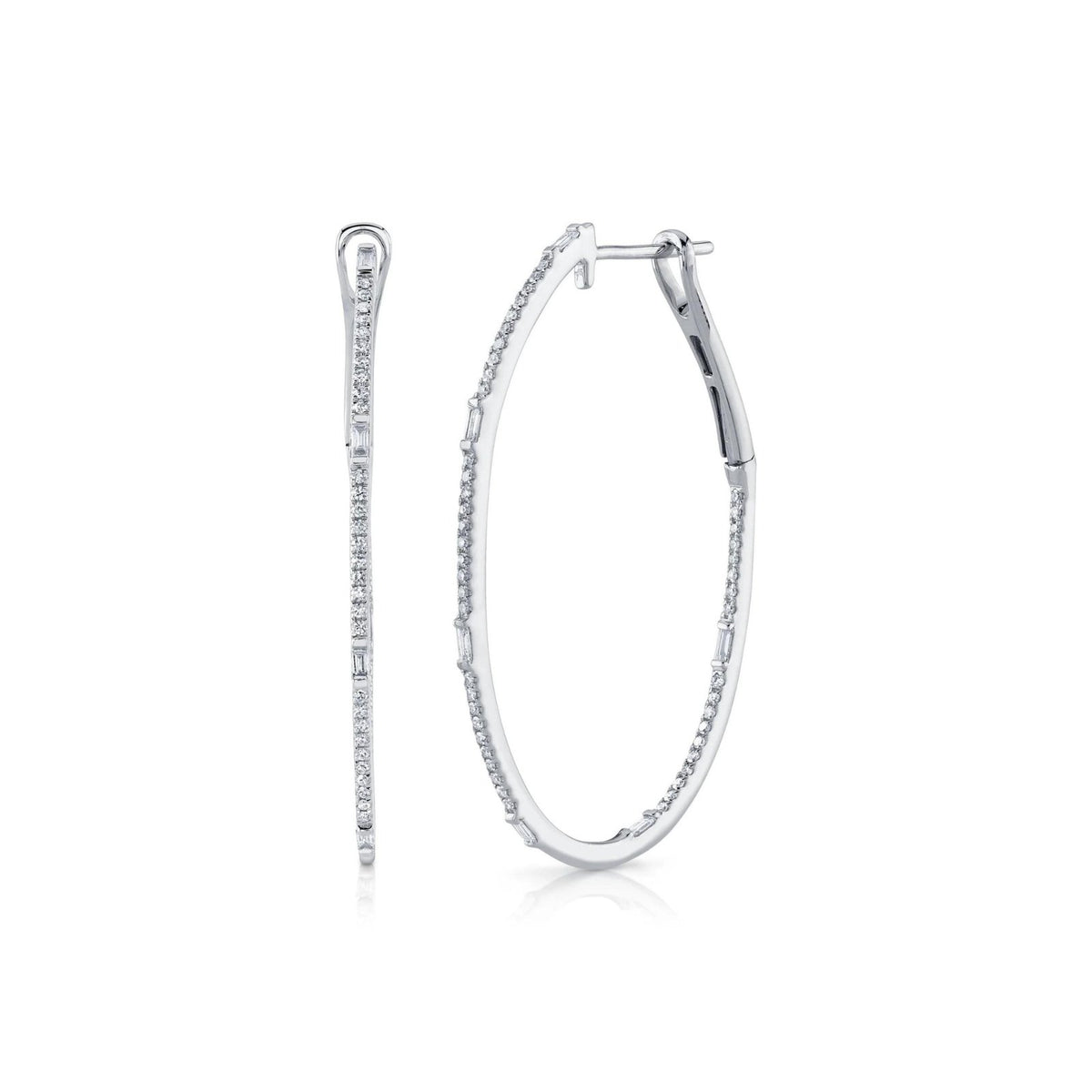 Shy Creation Diamond Baguette Oval Hoop Earrings - SC55004901V2 - Shy Creation Diamond Baguette Oval Hoop Earrings in 14 karat white gold with&nbsp; baguette cut and round cut diamonds totaling 0.44 carats.