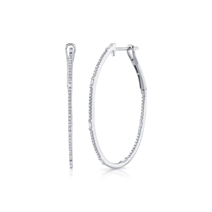 Shy Creation Diamond Baguette Oval Hoop Earrings - SC55004901V2 - Shy Creation Diamond Baguette Oval Hoop Earrings in 14 karat white gold with&nbsp; baguette cut and round cut diamonds totaling 0.44 carats.