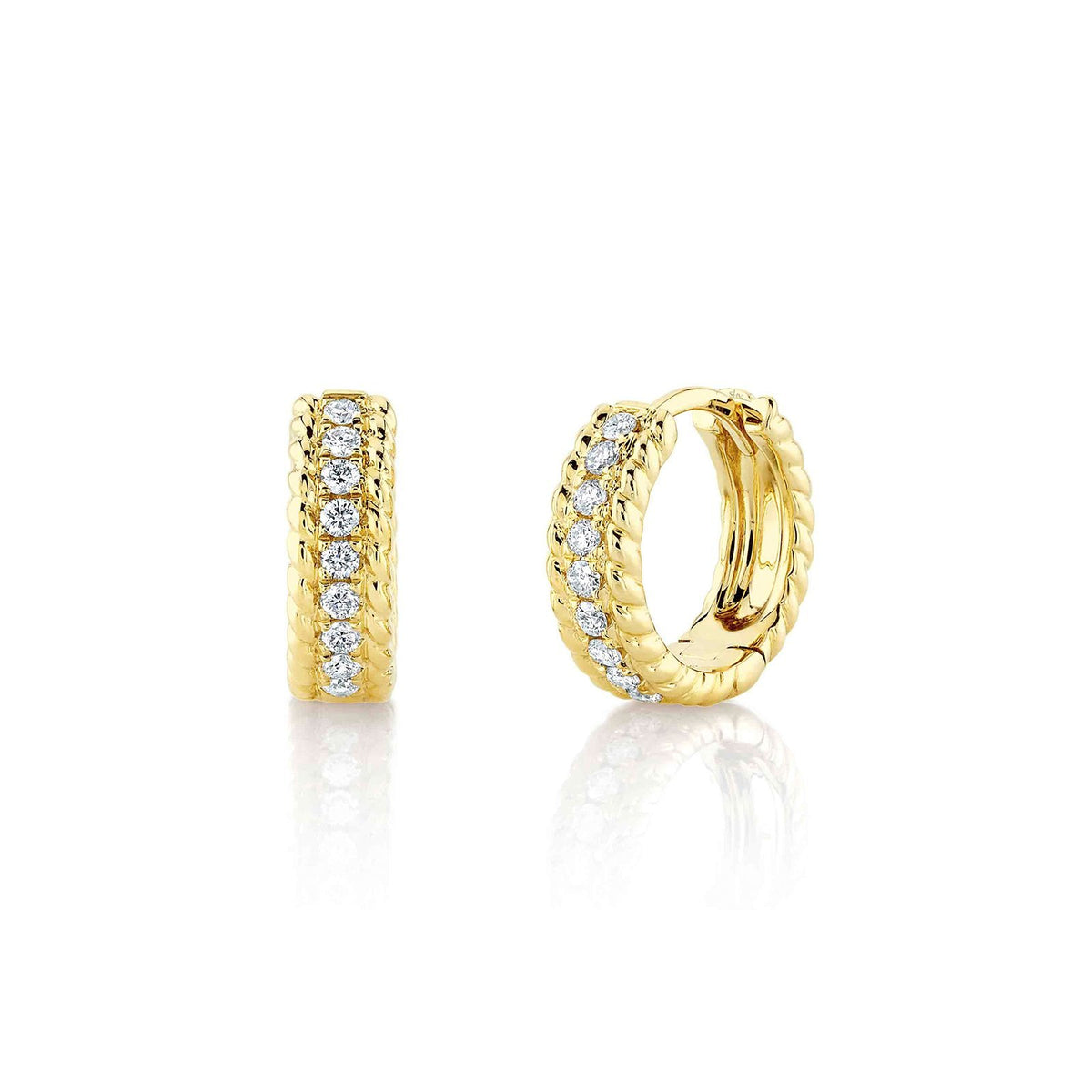Shy Creation Diamond Huggie Earrings in 14 karat yellow gold with diamonds totaling 0.18 carat.
