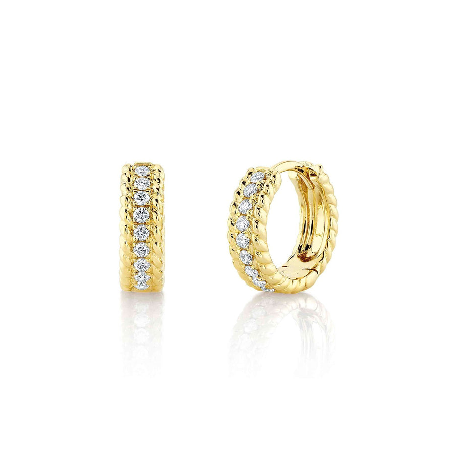 Shy Creation Diamond Huggie Earrings in 14 karat yellow gold with diamonds totaling 0.18 carat.