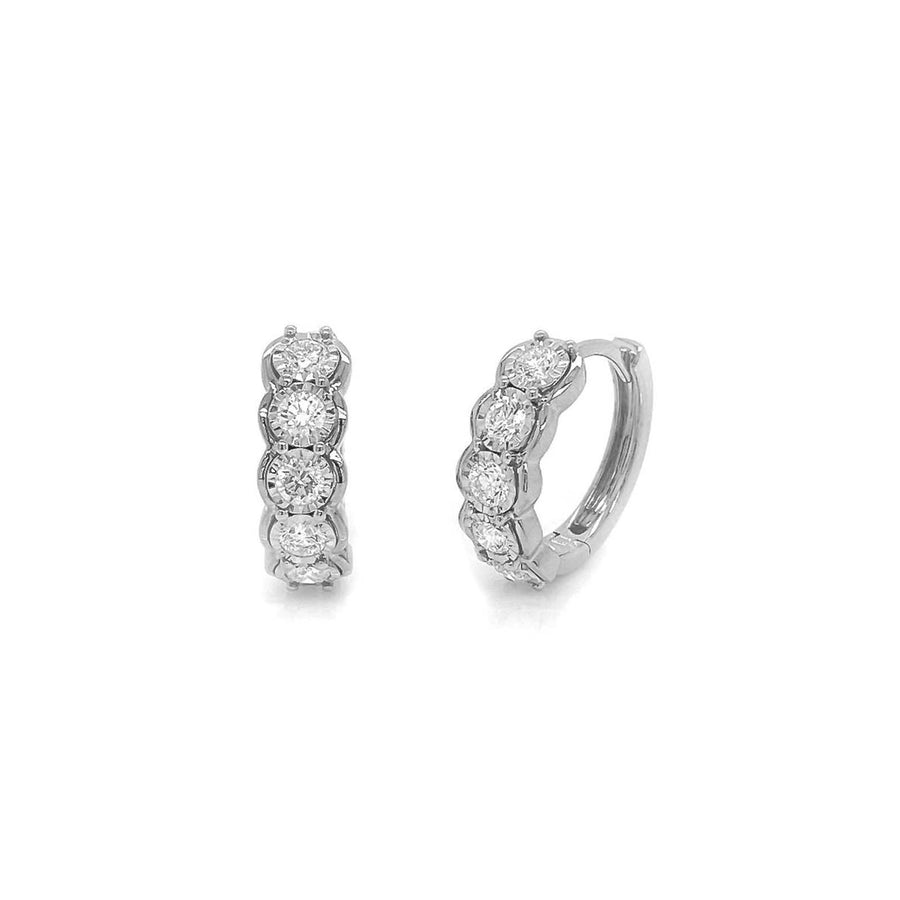 Shy Creation Diamond Huggie Earrings in 14 karat white gold with diamonds totaling 0.60 carats.