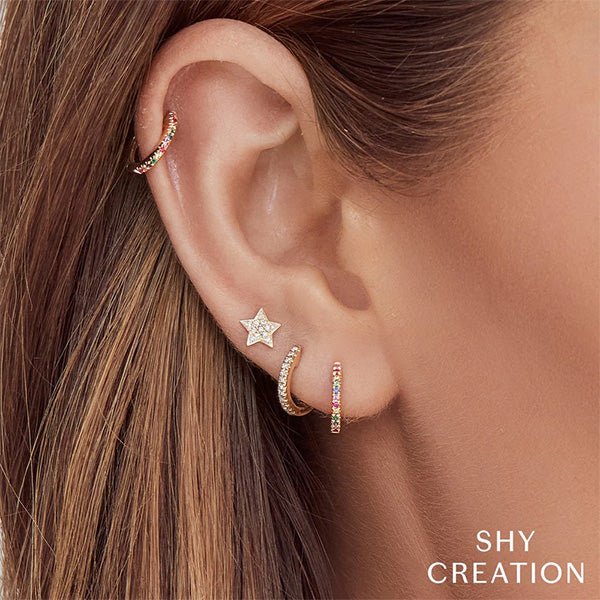 Shy Creation Diamond Star Stud Earrings in 14 karat yellow gold with pave diamonds.