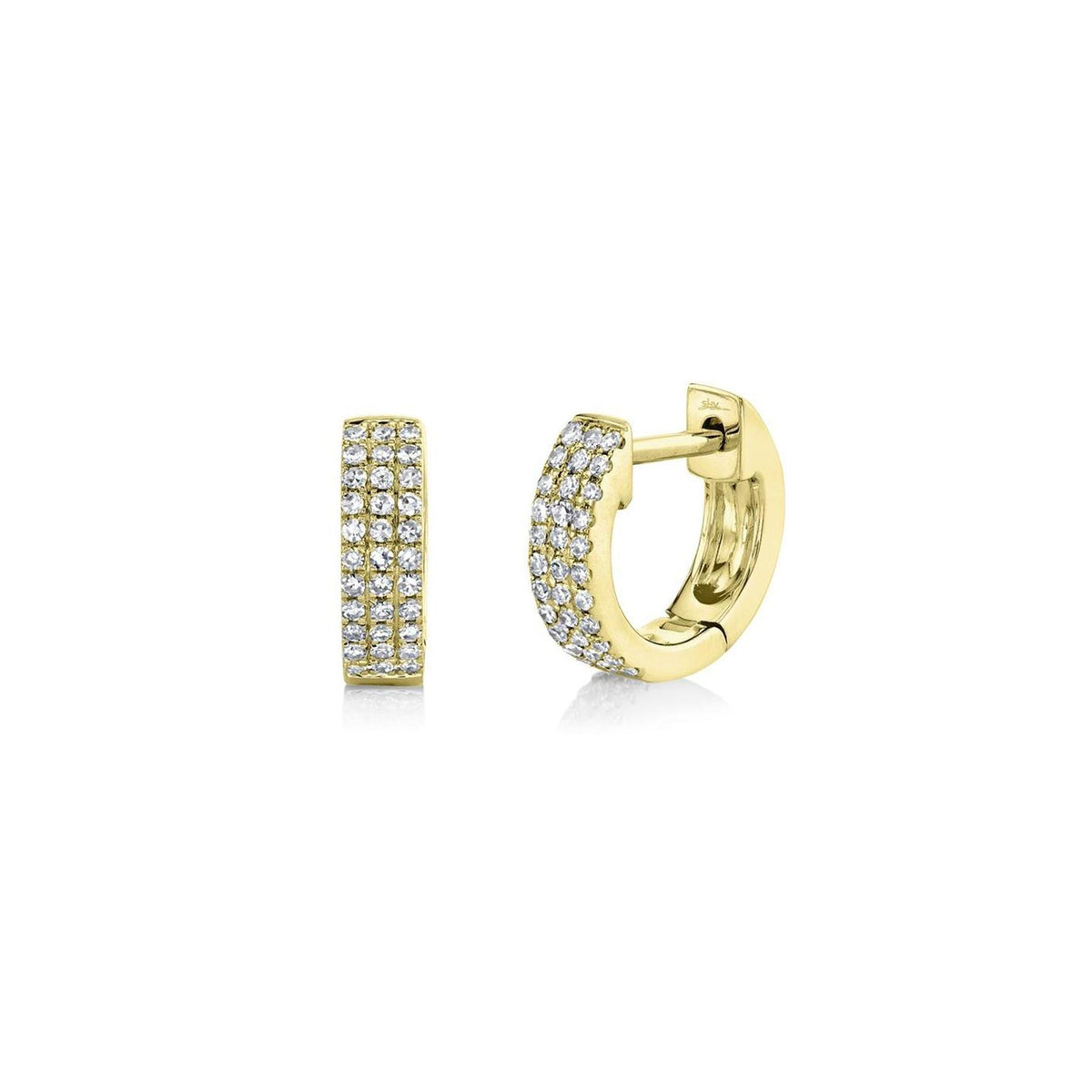 Shy Creation Mini Huggie Earrings in 14 karat yellow gold with diamonds totaling 0.17 carats.