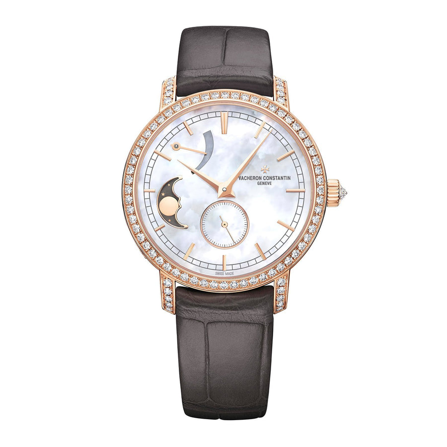 Vacheron Constantin Traditionnelle Moon Phase in a 36mm rose gold diamond bezel case with mother-of-pearl dial on leather strap, featuring a power reserve indicator, moon phase, small seconds display and hand-wound mechanical movement.